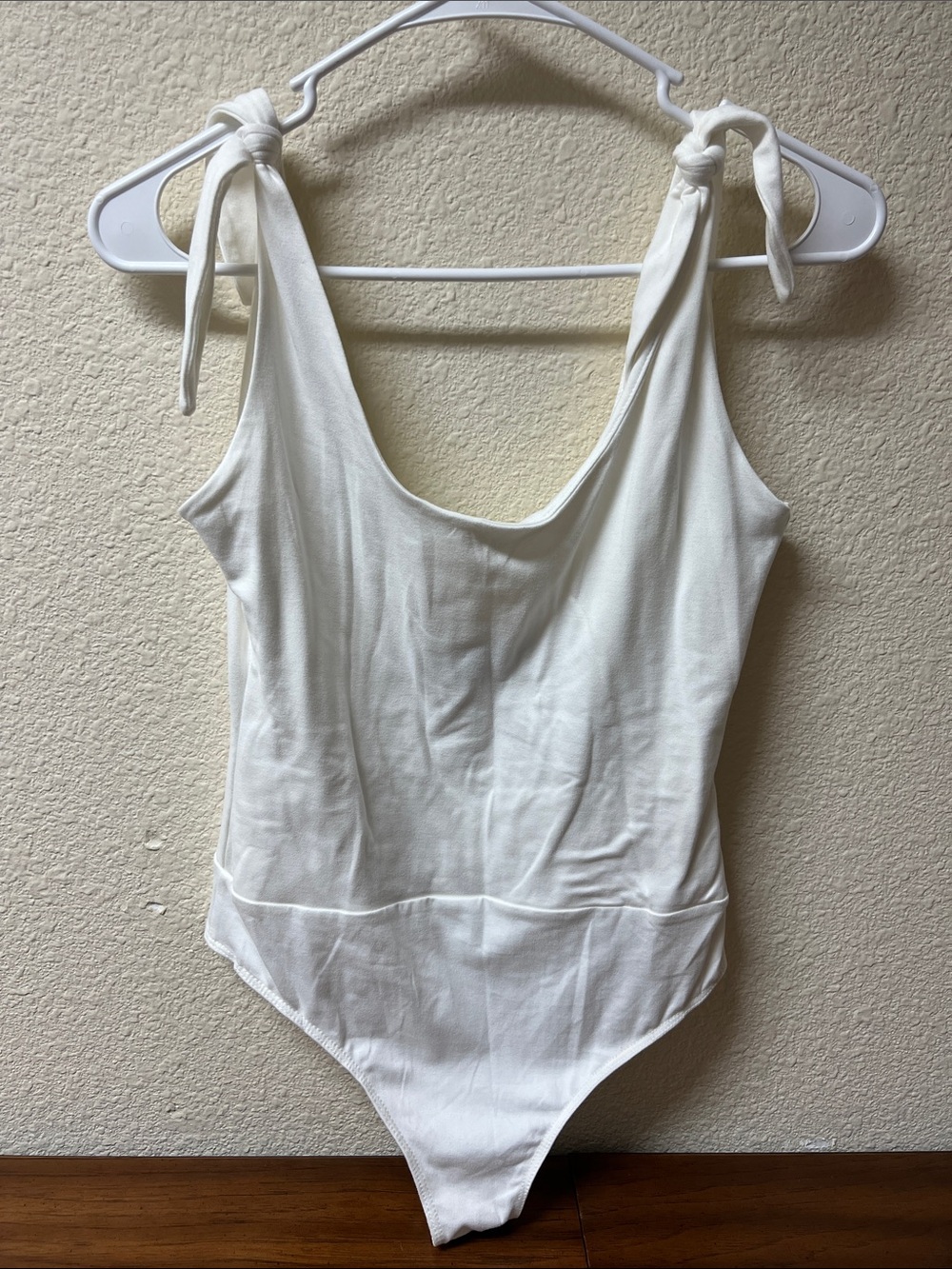 Lulu's White Tie-Shoulder Scoop Back Bodysuit